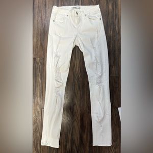 Just Black jeans with rips down down the legs